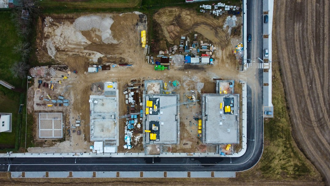 Top-down aerial view of a residential construction site, the kind of nadir mapping flight a DJI Mavic 3 Enterprise drone flies