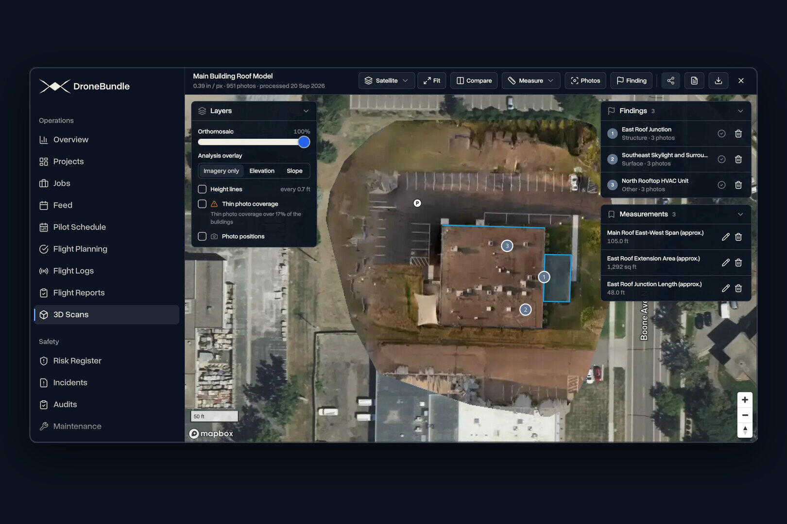 DroneBundle drone mapping software showing an orthomosaic of a commercial roof with saved measurements and inspection findings