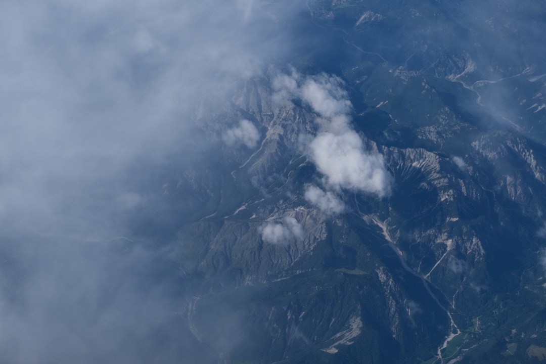 Commercial drone flying at altitude against a clear sky with altimeter overlay showing 400 feet AGL