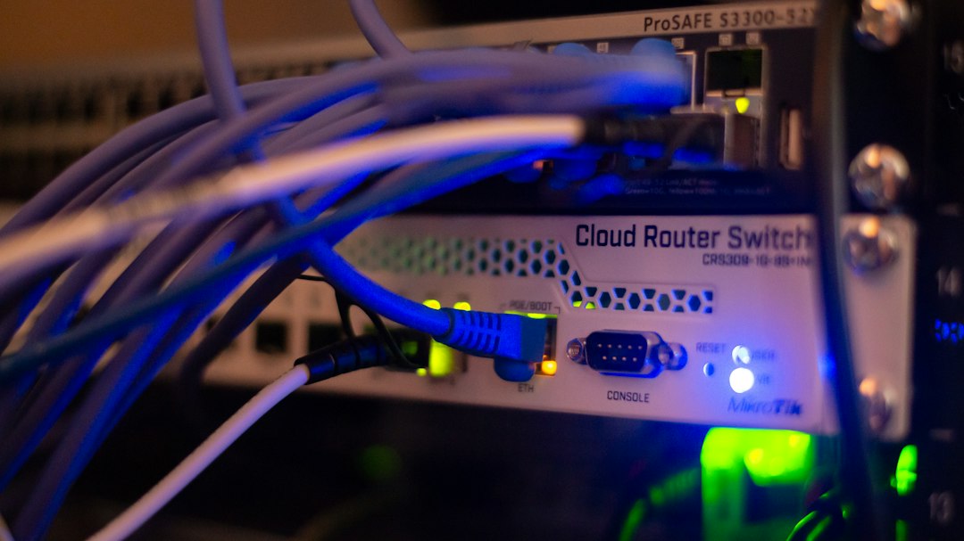 Network switch and server cabling representing the distributed computational systems that FAA Part 146 automated data service providers would run