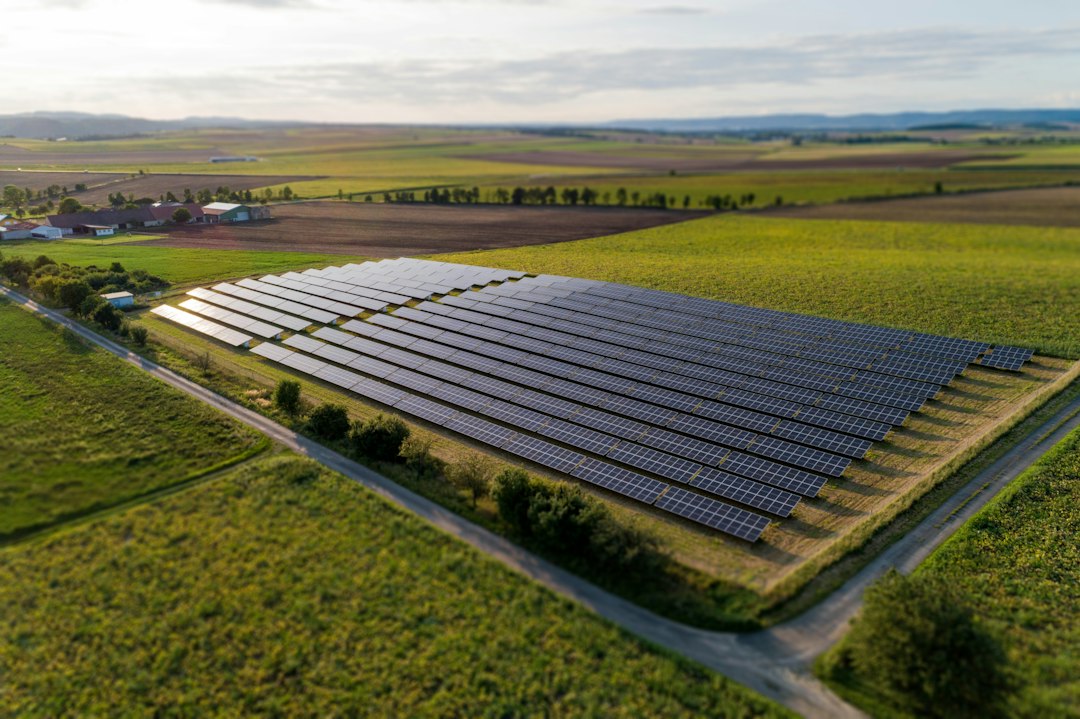 Aerial drone view of a rural solar farm, a typical site for drone thermal mapping surveys