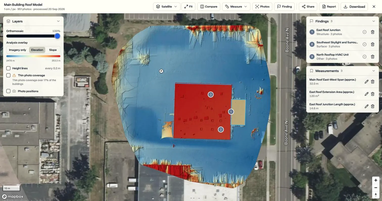 The elevation overlay in a DroneBundle 3D scan colouring a building and its surroundings by height