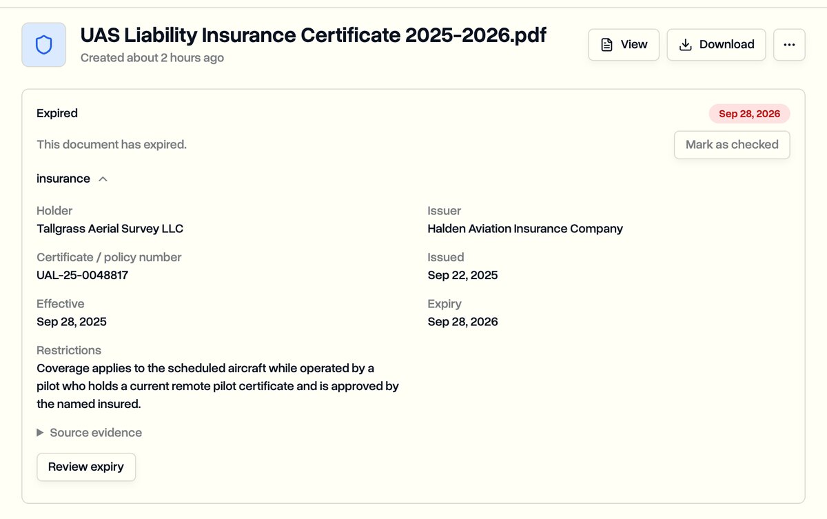 An expired insurance certificate with its holder, issuer, policy number, and dates read from the document